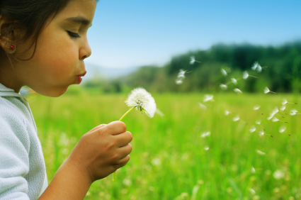 Girl playing in field